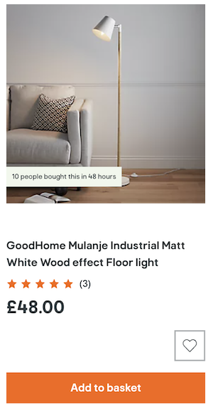 A card component for a floor lamp. It comprises an image with text overlaid about how many users have bought it, followed by the product name, a rating component and the price. Below this group are a button for a wishlist and another to add to basket.