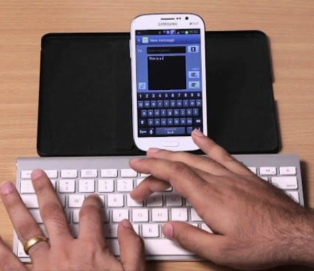 An external keyboard being used with a mobile device.