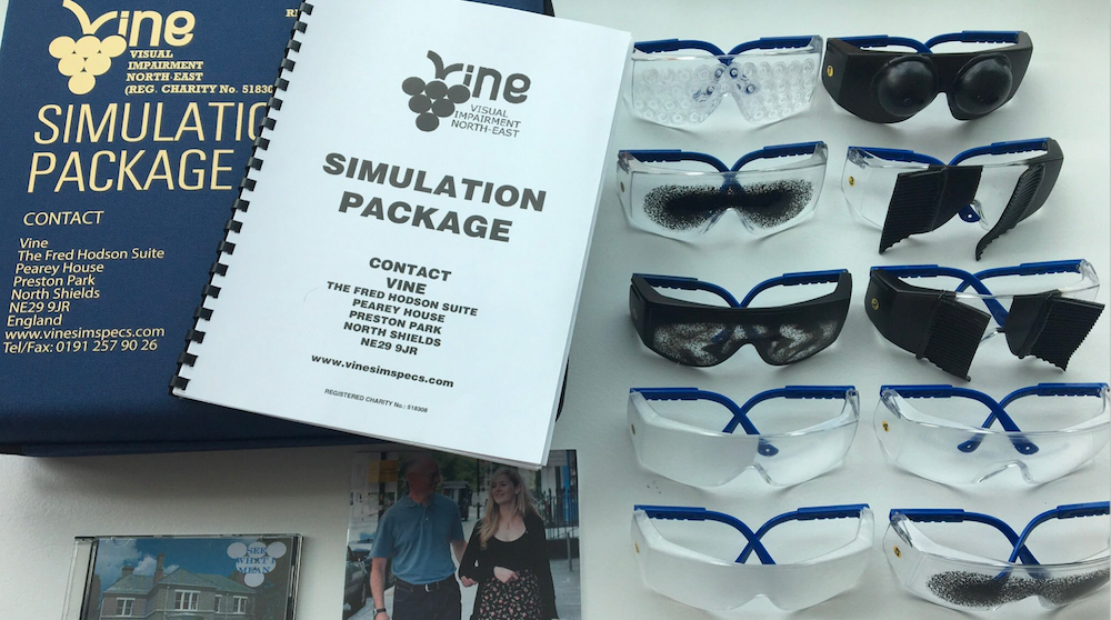 A set of ten glasses with different treatments applied to the lenses to show different types of visual impairment