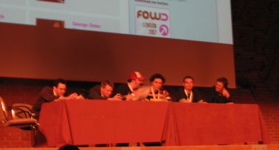 The speaker panel at the conference